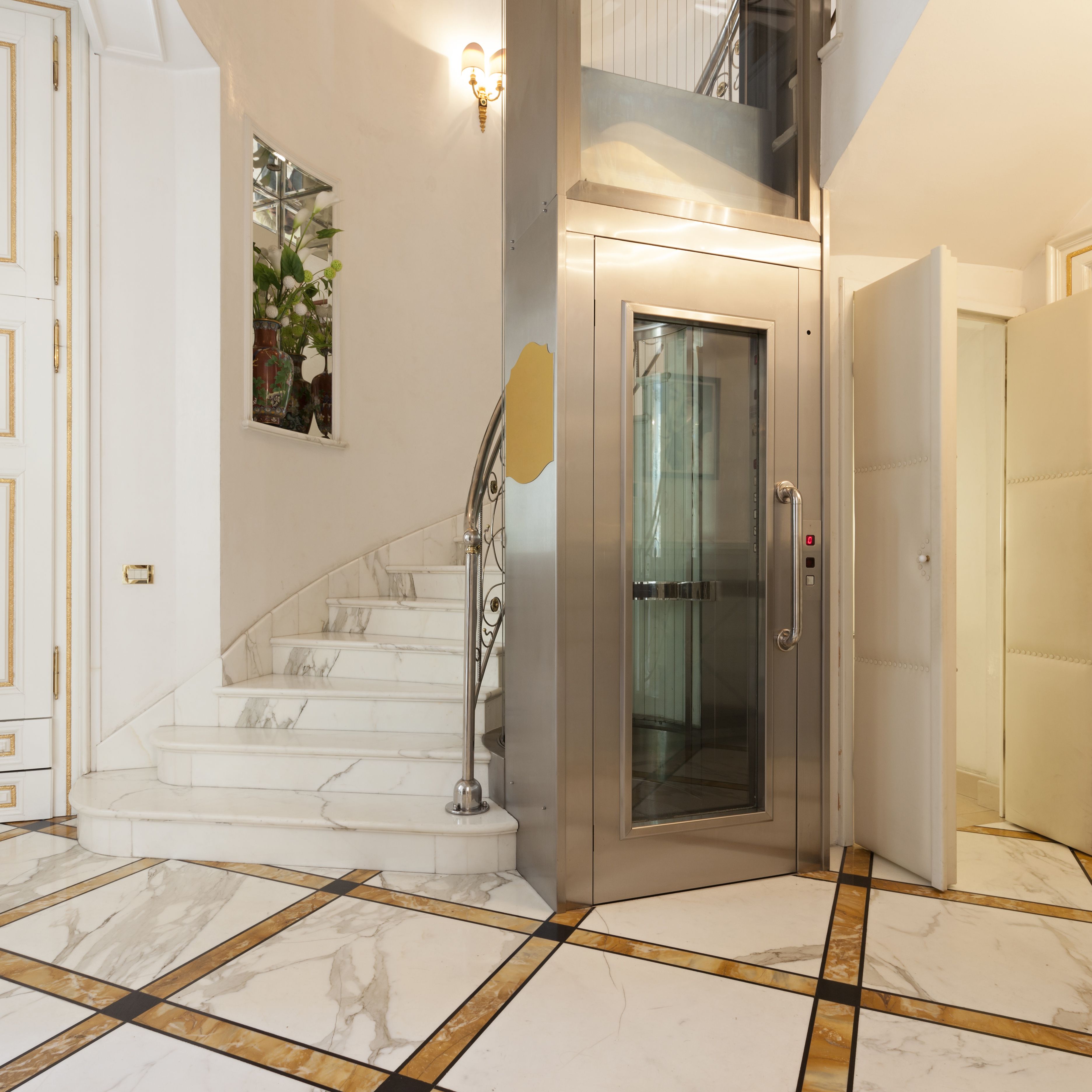 elevator-in-luxury-villa-526536845-ff1283c81a234f9ca99869c673d9351d